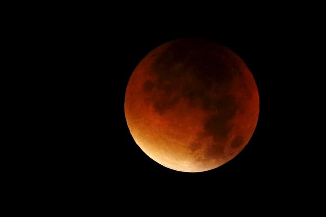 A supermoon is seen in the sky in Colmar